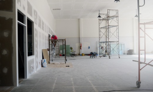 Worker Performing Post-Construction Cleanup Services