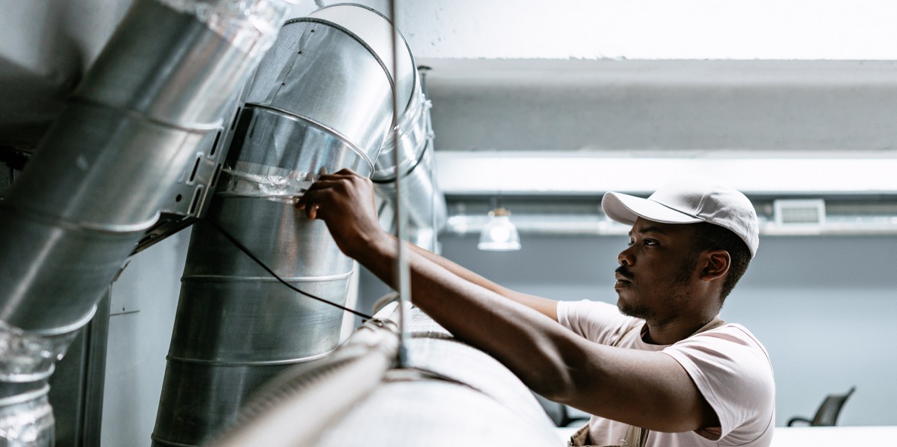 Technician Inspecting HVAC